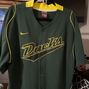 Nike Or. Duck Jersey. Button up short sleeve never worn with stitched appliqué.